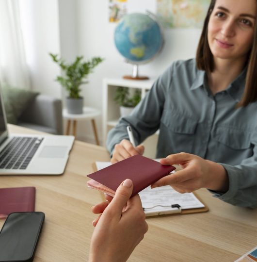 high-angle-woman-working-as-travel-agent